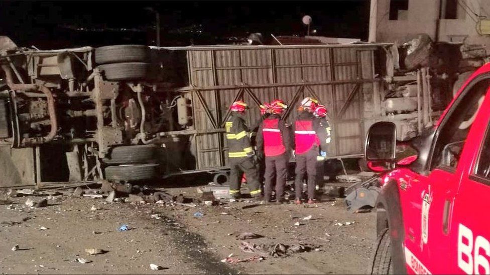 A view of the overturned bus