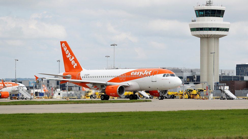 An Easyjet Airbus aircraft taxis close to the northern runway at Gatwick Airport in Crawley, Britain, August 25, 2021