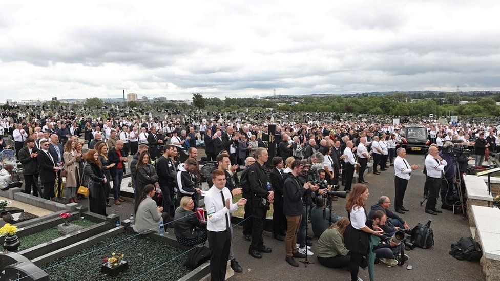 A large crowd also attended the cemetery