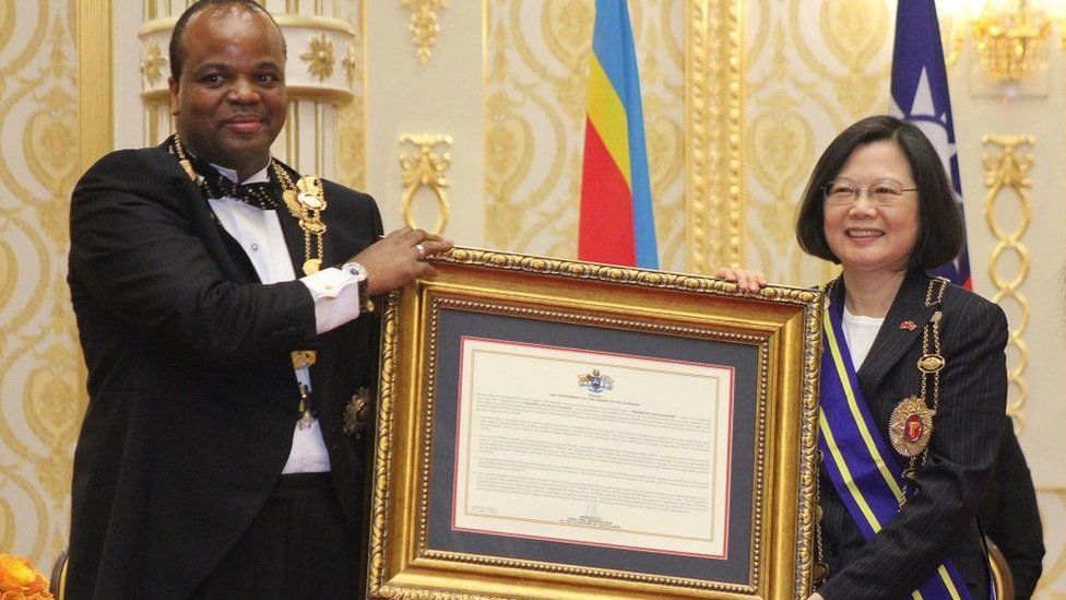 Swaziland absolute Monarch King Mswati III (L) poses with Taiwan President Tsai Ing-wen (R) after awarding her with the Order of the Elephant during her visit to the Kingdom of Swaziland at an official ceremony on April 18, 2018 in Lozitha Palace, Manzini.