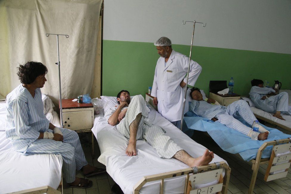 Injured survivors in a Kabul hospital, 24 July