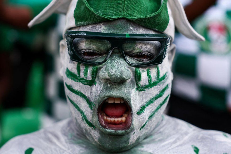 A Nigeria's supporter reacts ahead of the Africa Cup of Nations group A football match between Guinea-Bissau and Nigeria.