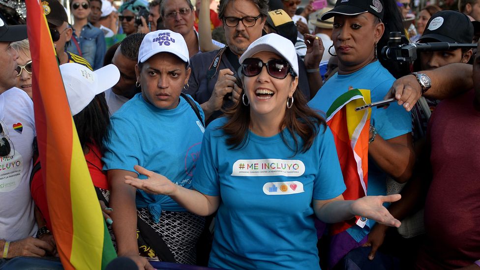 Mariela Castro (C), daughter of Cuban former President Raul Castro, participates in the gay pride parade during the celebration of the day against homophobia and transphobia in Havana, on May 12, 2018