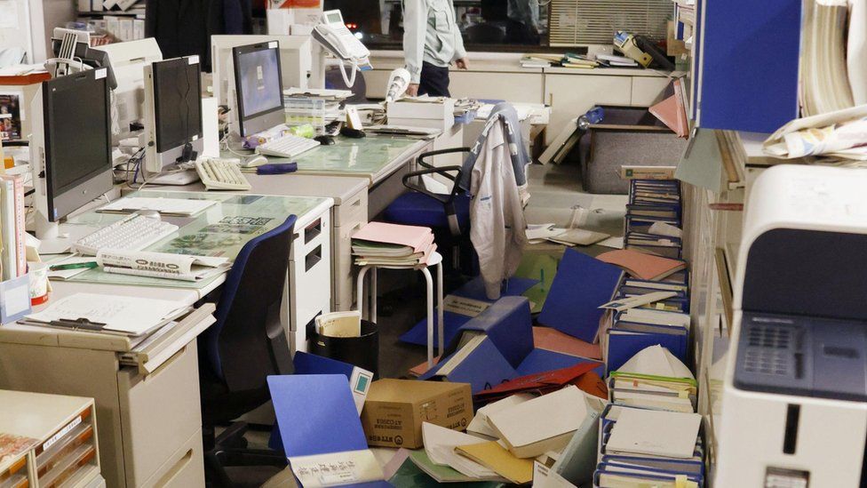 Office supplies all over the floor of an office in Hirono