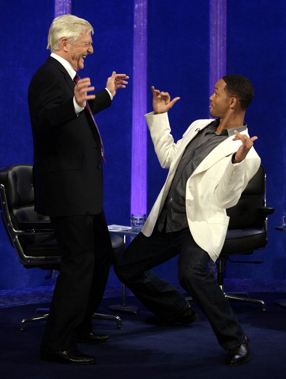 Sir Michael Parkinson and Will Smith dancing
