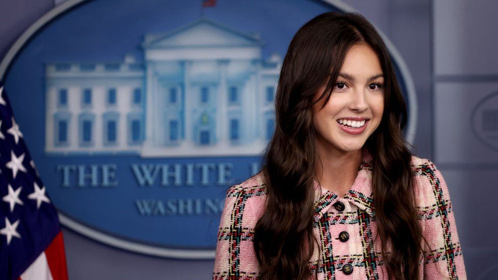 Pop music star and Disney actress Olivia Rodrigo makes a brief statement to reporters at the beginning of the daily news conference in the Brady Press Briefing Room at the White House on July 14, 2021 in Washington, DC