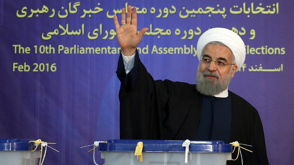 President Hassan Rouhani waves after casting his votes in Tehran, Iran (26 Feb. 2016) (handout photo)