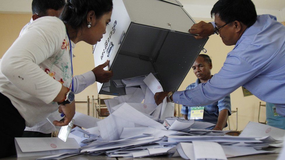 officials count votes