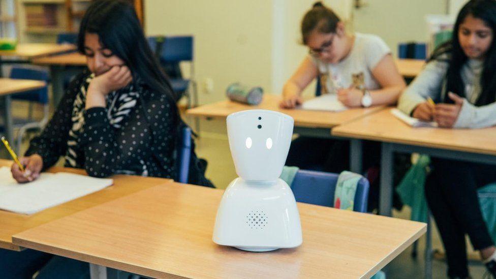 AV1 robot on a classroom desk