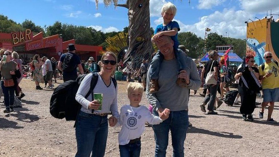 Gareth Turnbull with his partner and their children at Glastonbury