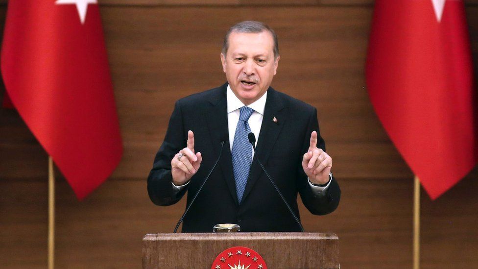 Turkey"s President Recep Tayyip Erdogan delivers a speech during the mukhtars meeting at the Presidential Complex in Ankara on April 19, 2016.