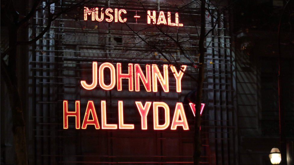 The Olympia Music theatre lights up with the name of Johnny Hallyday in Paris on December 8, 2017.