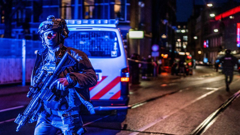 Members of DSI arrive at scene of a hostage situation at the Apple store in Leidseplein, Amsterdam, the Netherlands, 22 February 2022. A