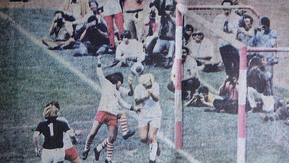 The pink hooped goalposts can be seen in this cutting showing Mexico v England, 1971 Women's World Cup