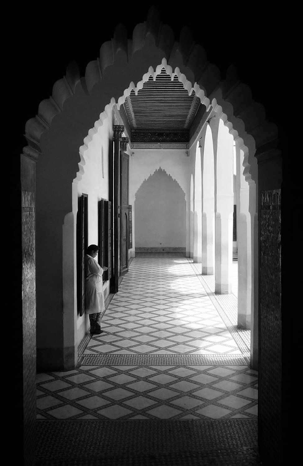 An attendant waiting for visitors to arrive