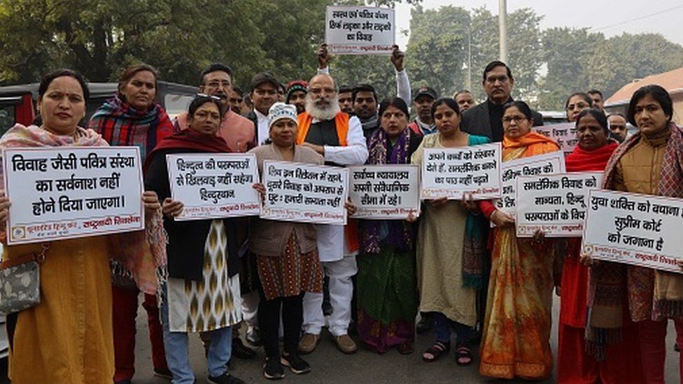 Members of a Hindu group protest against same-sex marriage during a hearing outside the Supreme Court in Delhi on January 6, 2023