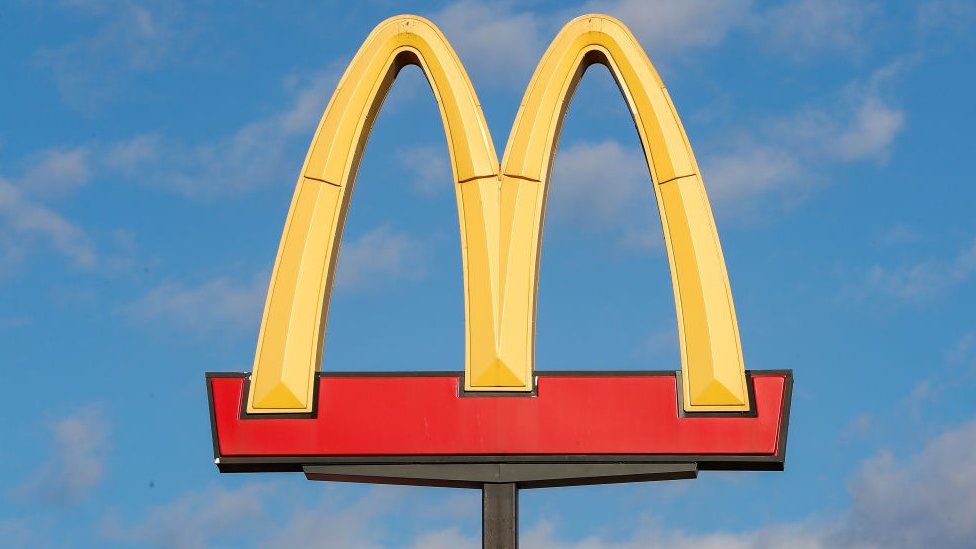 A view of a McDonald's food restaurant logo sign.