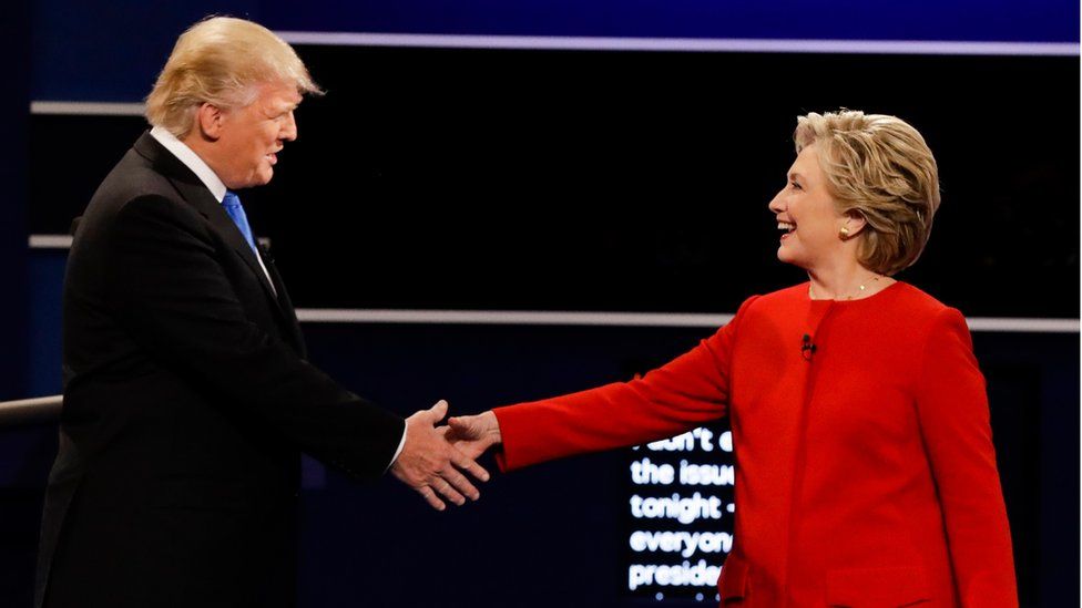 Trump and Clinton shake hands