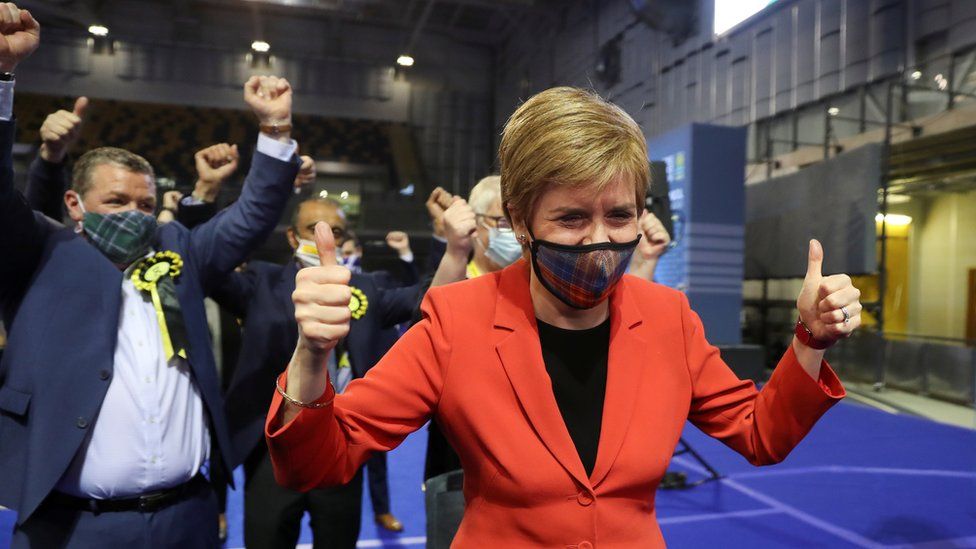 Scottish First Minister Nicola Sturgeon gestures as she visits a counting centre as votes are counted for the Scottish Parliamentary election, in Glasgow, Scotland