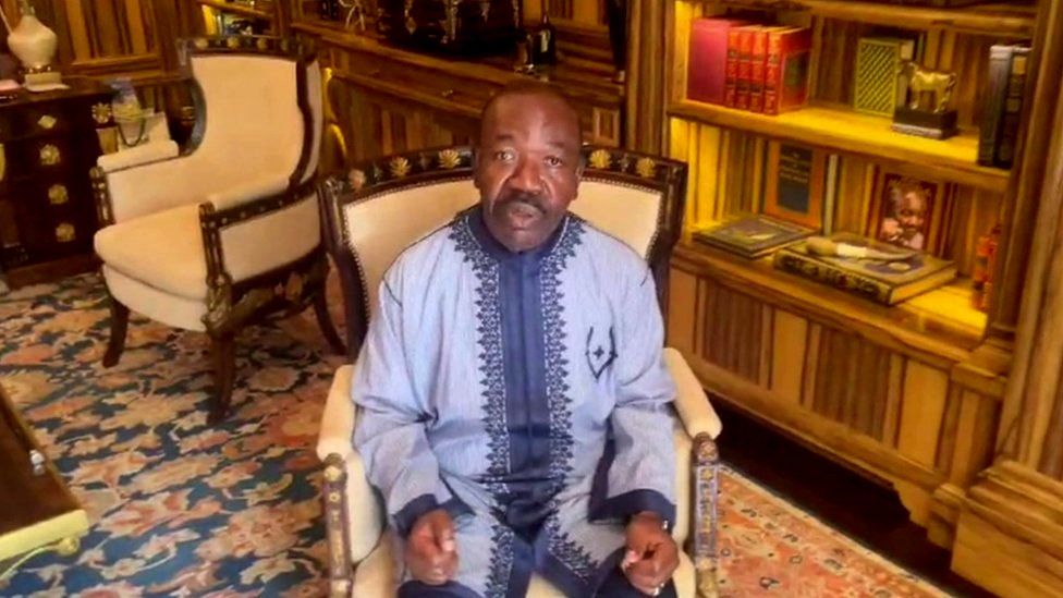 still from video of Ali Bongo