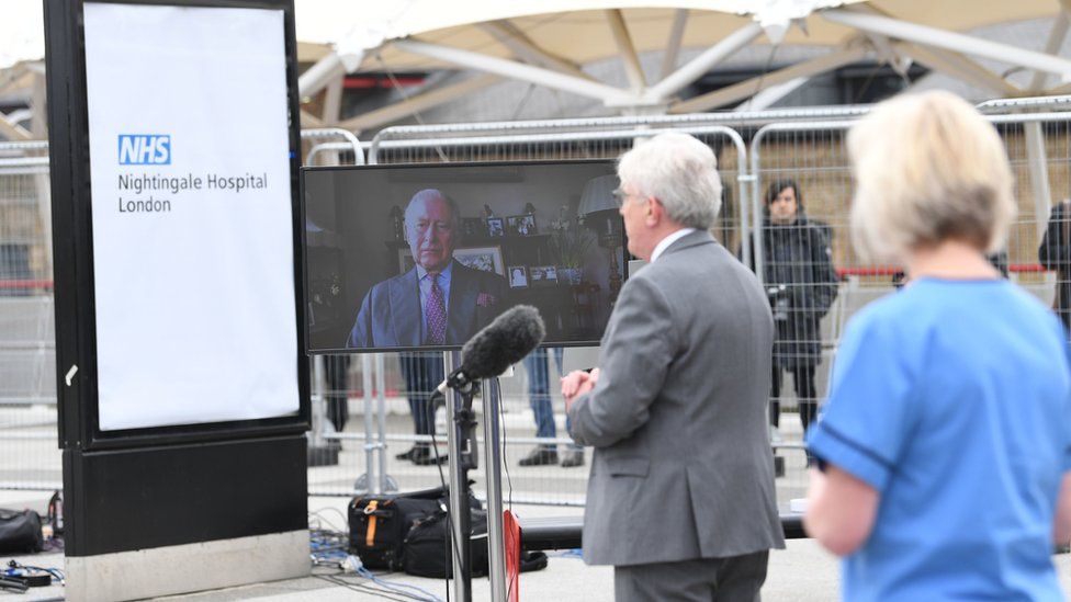 The Prince of Wales, known as the Duke of Rothesay while in Scotland, sends a video message to guests at the opening of the NHS Nightingale Hospital at the ExCel centre in London