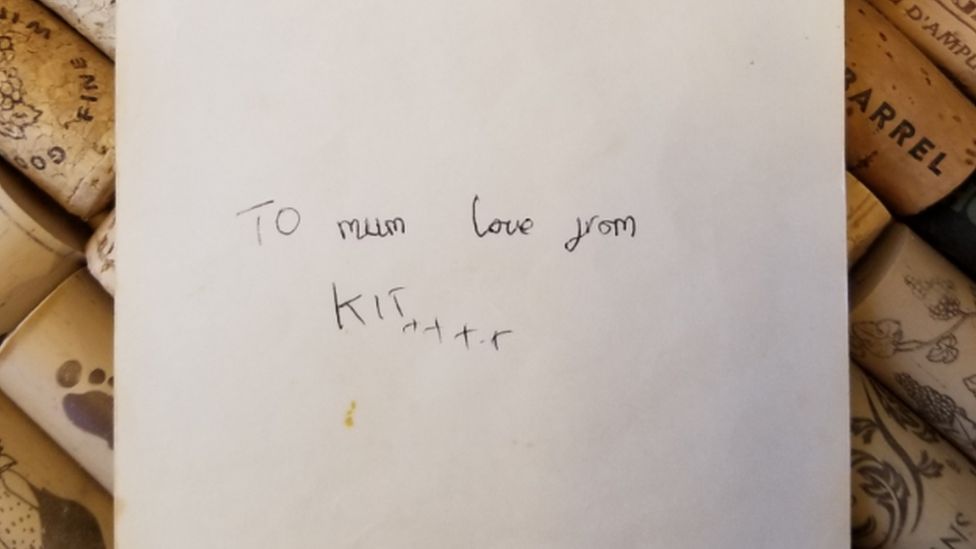 Card signed by Kit