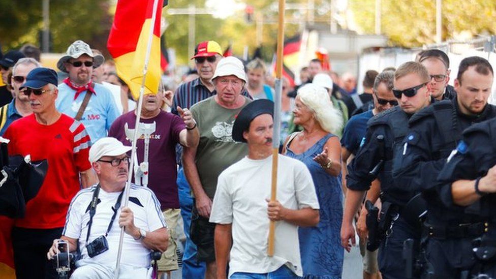 Protesters against Angela Merkel in Dresden on 16 August