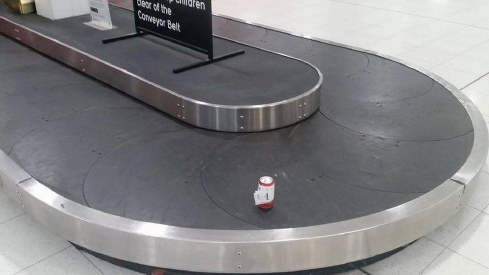 The can on a conveyor belt at Perth Airport