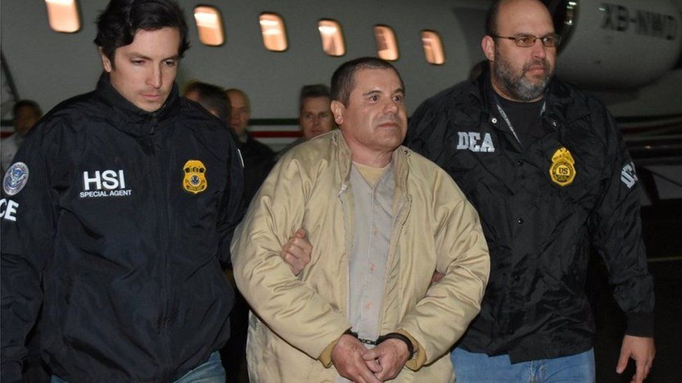 Joaquin Guzman escorted by police at Long Island MacArthur airport in New York - 19 January