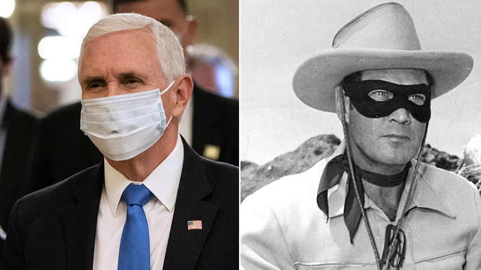 US Vice-President Mike Pence in a coronavirus face mask and the Lone Ranger in an eye mask