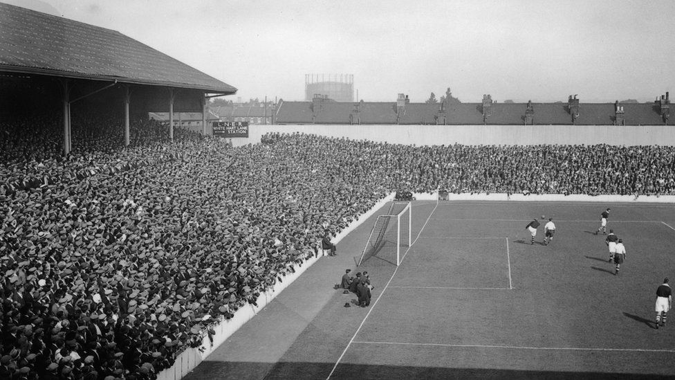 Crowds at White Hart Lane, London, watching the home side, Tottenham Hotspur, play Charlton Athletic, 27th August 1932. Spurs won the match 4-1.