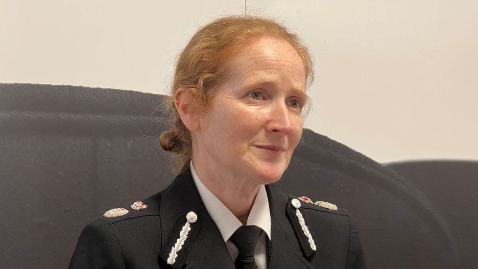 Catherine Roper, chief constable of Wiltshire Police, sitting in her uniform