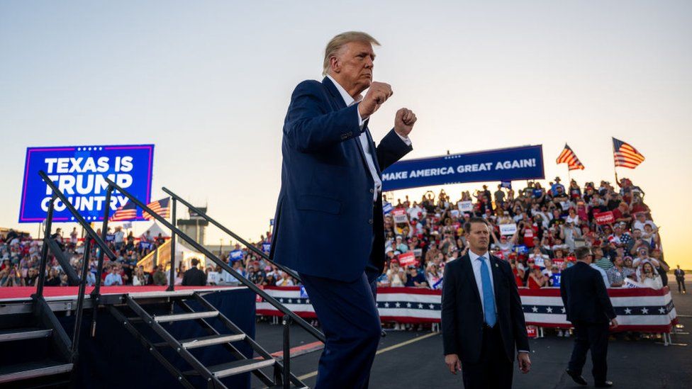 Donald Trump dances during a rally at the Waco Regional Airport on March 25, 2023