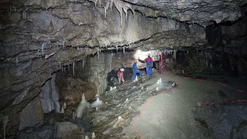 Cavers in a cave