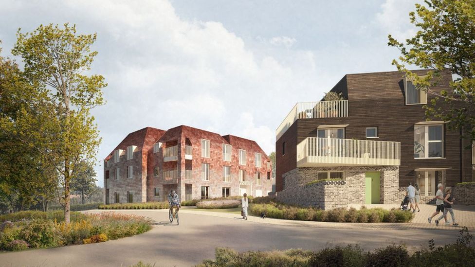 An artist's impression of how some of the new homes might look, with some having red brick features. There are also people riding bicycles and others jogging past greenery