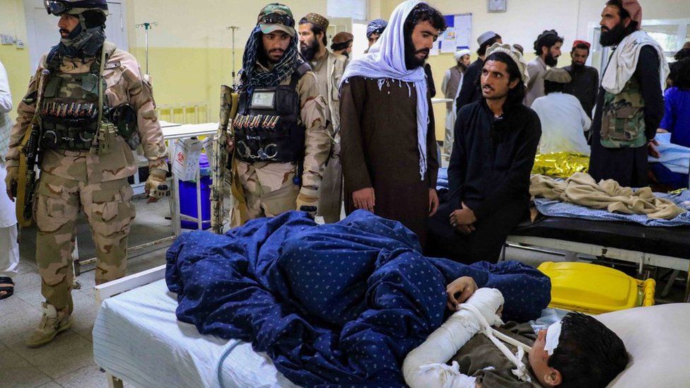 An injured victim of the earthquake receives treatment at a hospital in Paktia, Afghanistan, 22 June 2022.