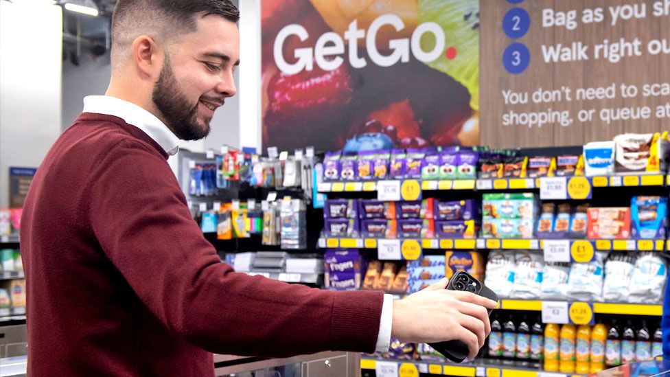 Tesco handout photo of a customer using the Tesco GetGo store in Holborn, London