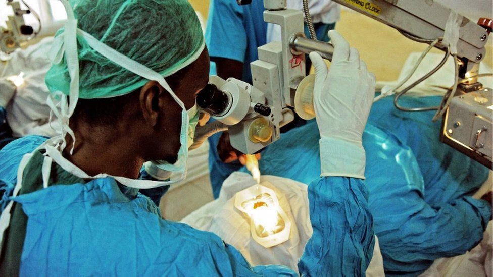 A doctor performs free cataract surgery at Al Nuur eye Hospital in Mogadishu, on February 16, 2015. More than 800 patients annually receive free cataract surgery at Al Nuur Eye Hospital as part of a drive to improve the eyesight of members of poorer communities.