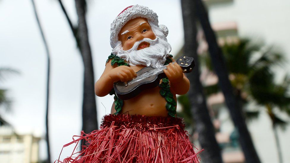 Santa in a hula skirt