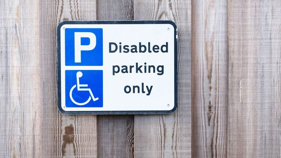 A sign for disabled parking only