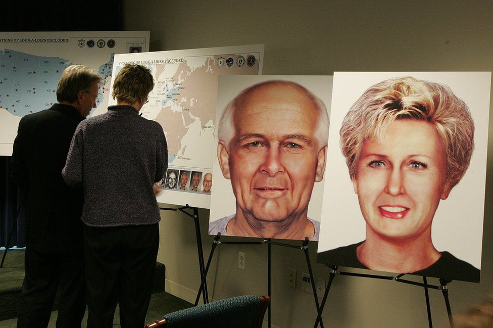 A display board shows two pictures of what Whitey Bulger and Catherine Greig were believed to look like in 2004