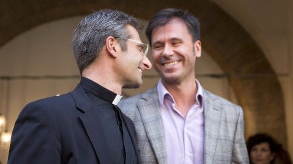 Monsignor Krzysztof Charamsa (left) and his partner Eduard in Rome (03 October 2015)