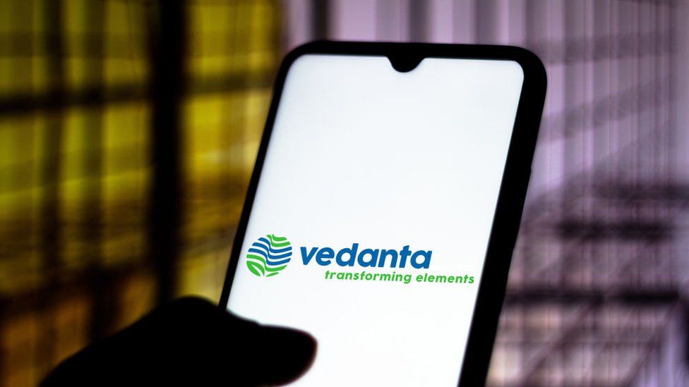 In this photo illustration the Vedanta Limited logo seen displayed on a smartphone.