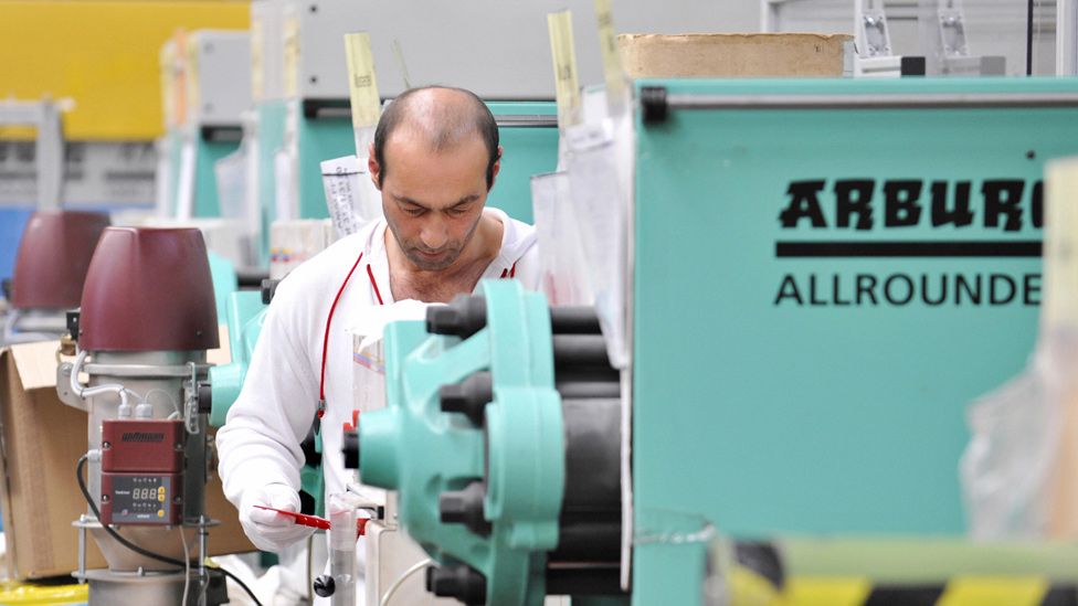 Worker at India-Dreusicke engineering firm in Berlin, 2008 file pic