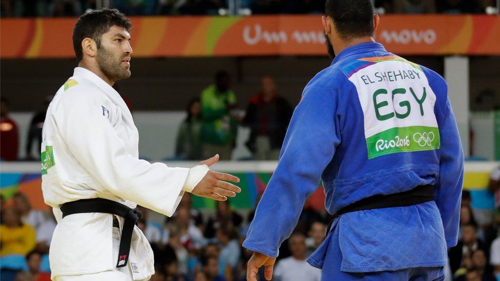 Egypt's Islam El Shehaby declines to shake hands with Israel's Or Sasson after losing in the 100kg judo competition