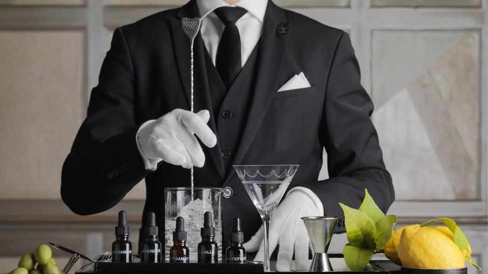 Waiter mixing Martini