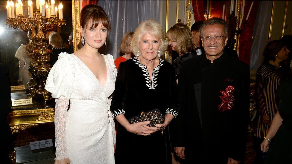 Mr Amersi with his partner Nadezhda Rodicheva and the Duchess of Cornwall at a charity fashion show in 2018