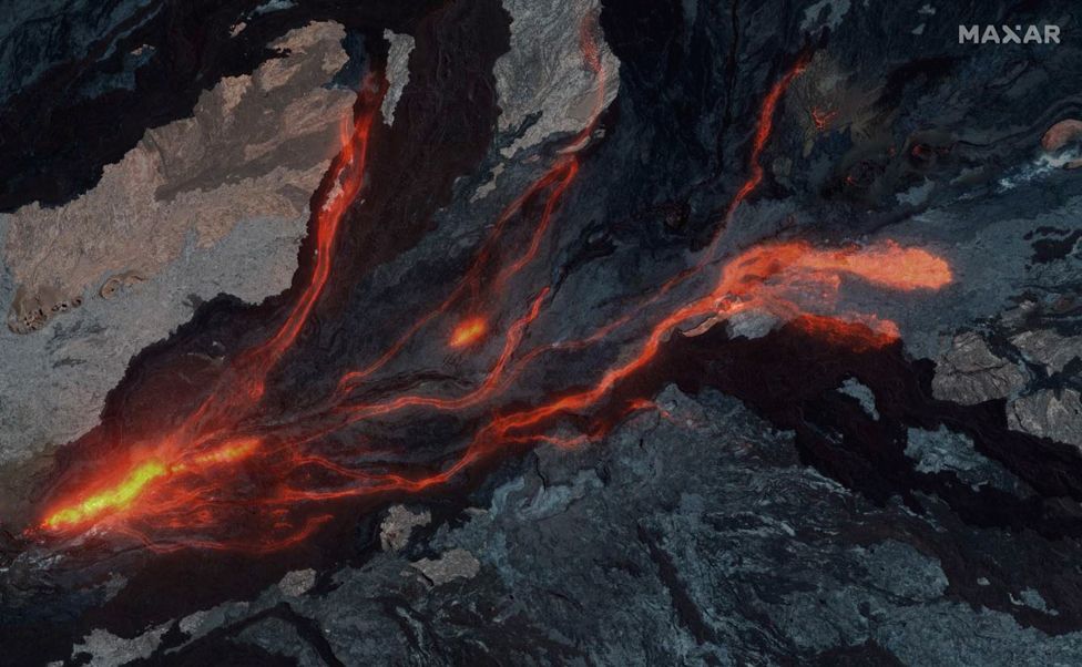 Composite satellite images show rifts and lava flow of Hawaii's Mauna Loa Volcano in Hawaii, US. July 15, 2022.