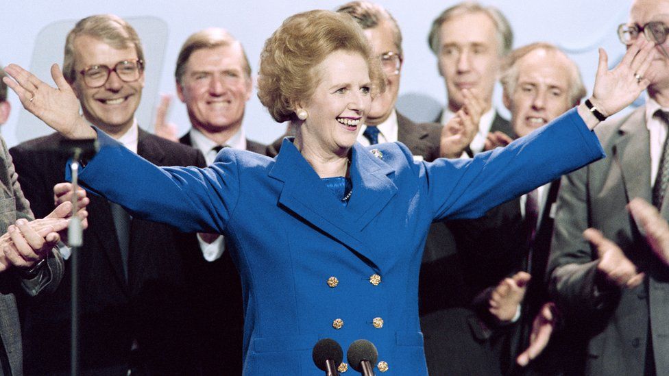 Margaret Thatcher in a blue suit jacket