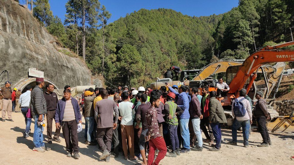 People crowd the site of rescue